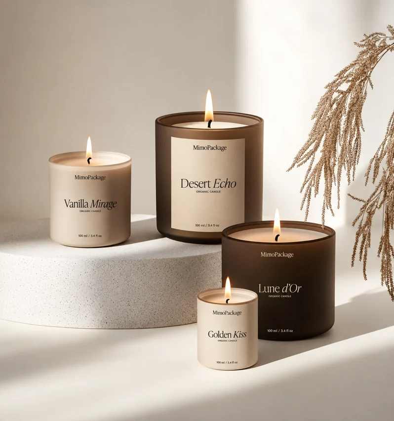 MimoPackage candle vessels in ivory and warm brown glass